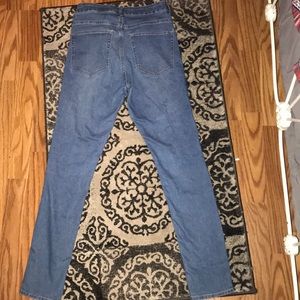 Two pairs of simple, lightly worn jeans.